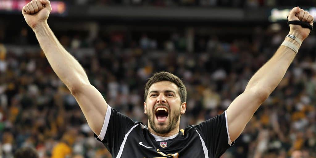 Person celebrating a sports bet win on an underdog.